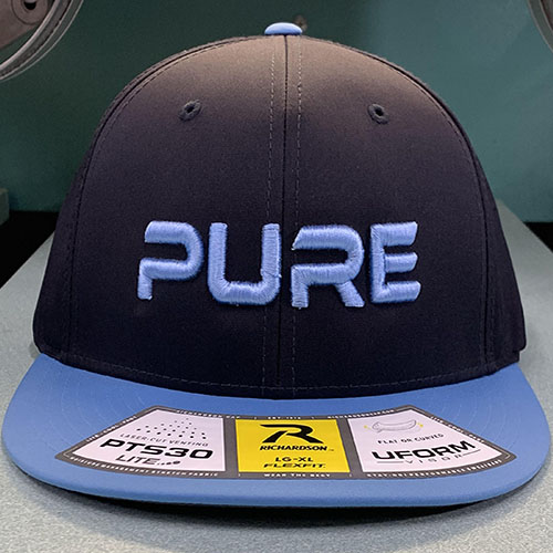 PURE Sports Richardson Columbia Blue Navy with Columbia Blue Lettering